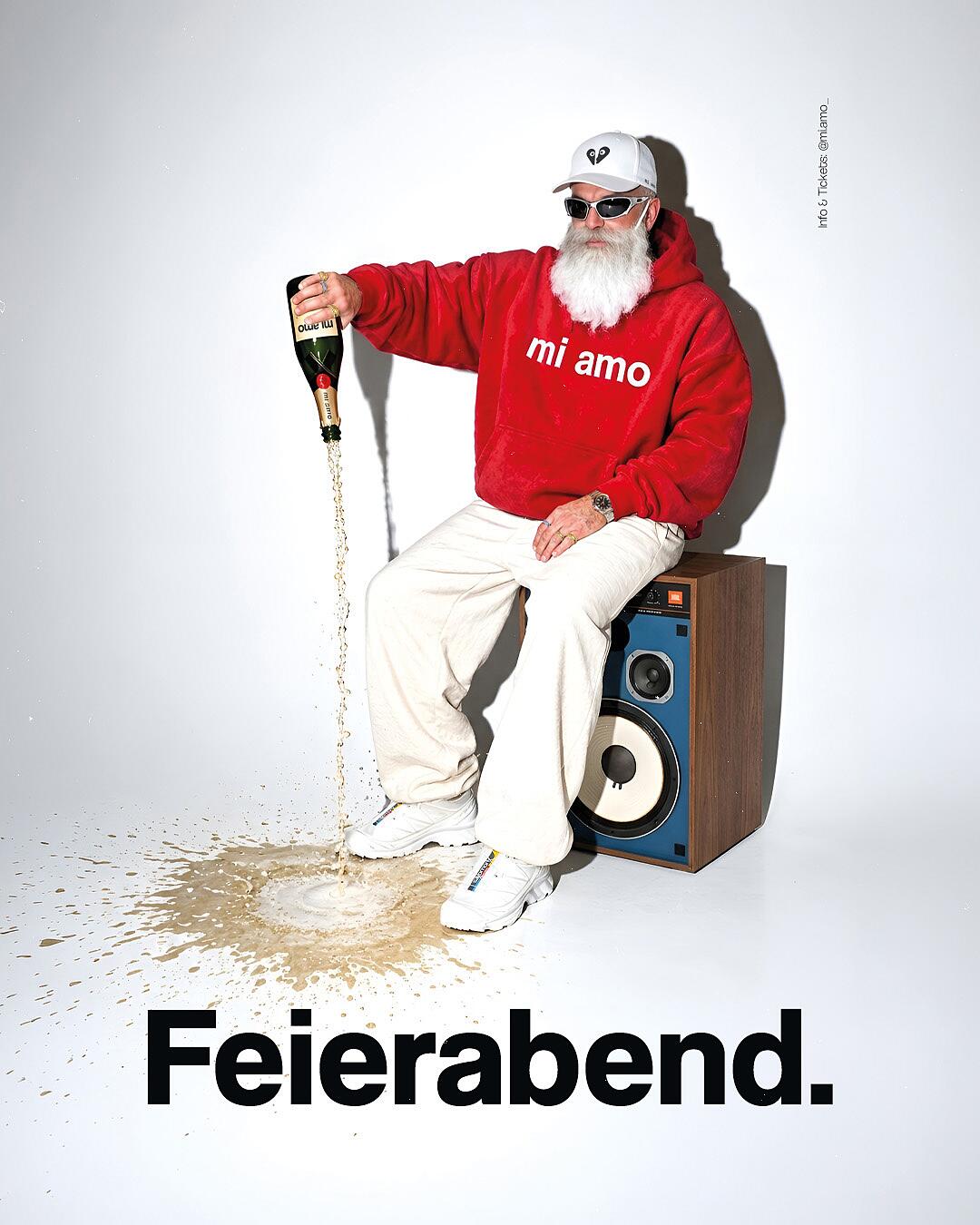 mi amo, feierabend-grafik mit mann auf lautsprecher und großer datumszahl